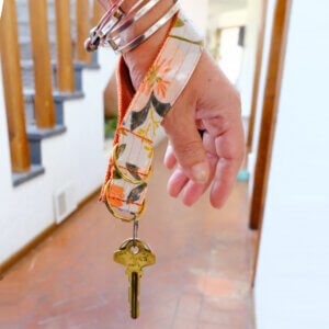 key chain laminated floral flourish