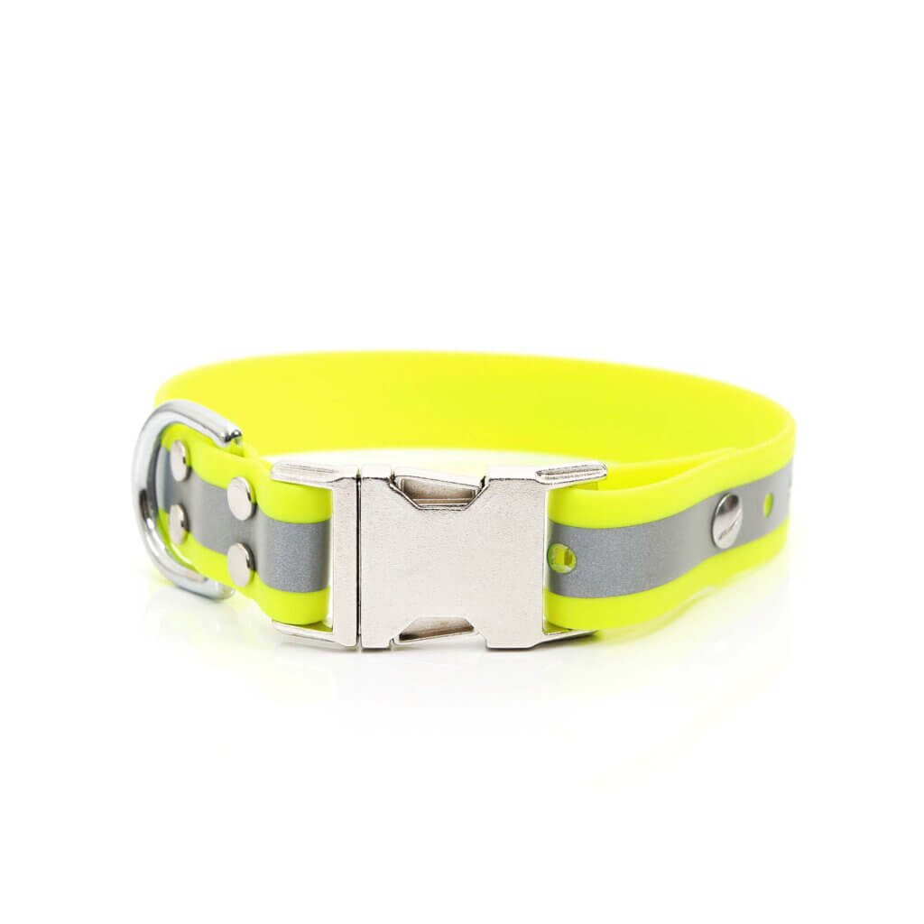 A bright yellow, reflective dog collar on a white background