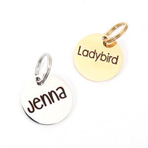 round id tags silver and gold - says jenna and Ladybird.
