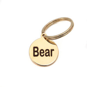 small round gold id tag w split ring (front)